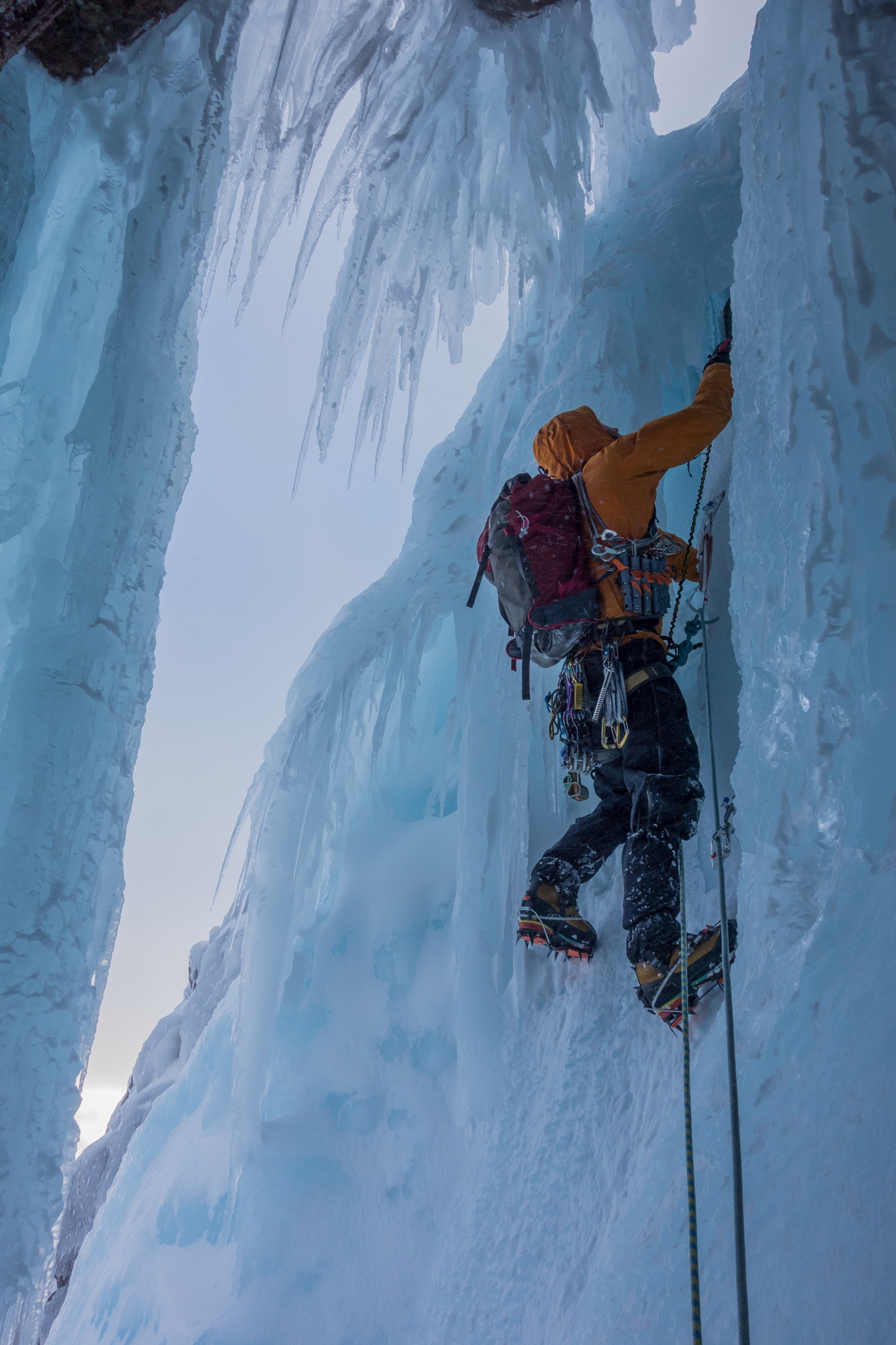 Scoping out the way ahead at the start of the crux pillar - the cavity under the ice to my left was amazing!
