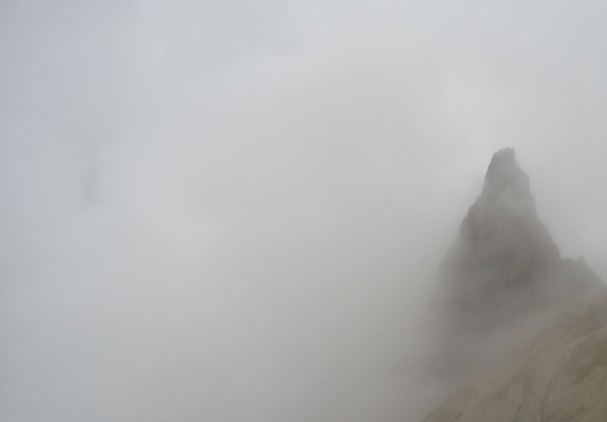 The Aiguille de L'Index emerges briefly from the clouds - spooky!