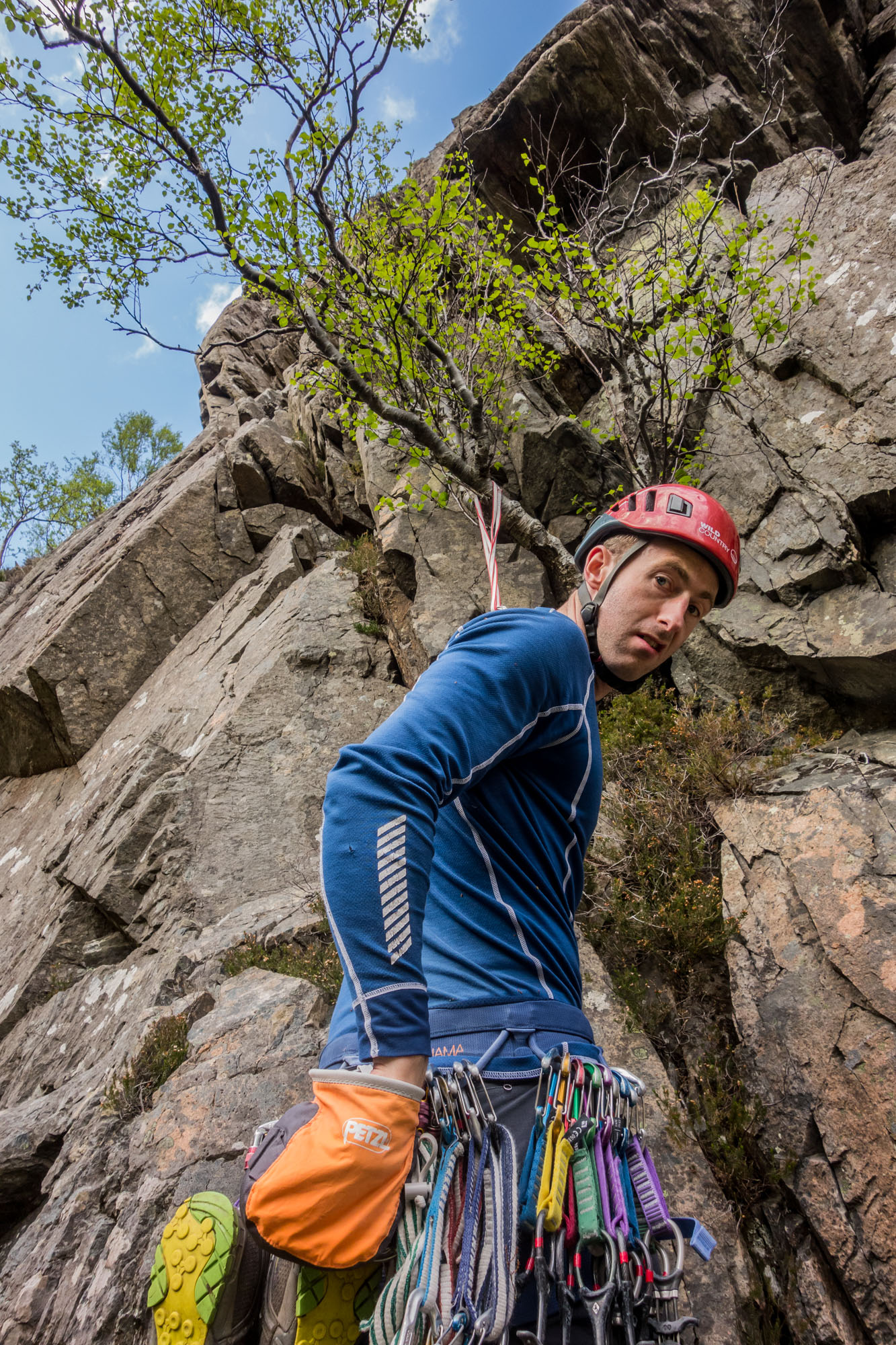 The face says it all - steep, vegetated and loose crack climbing is followed by a squeeze-chimney on the worryingly named Cervix