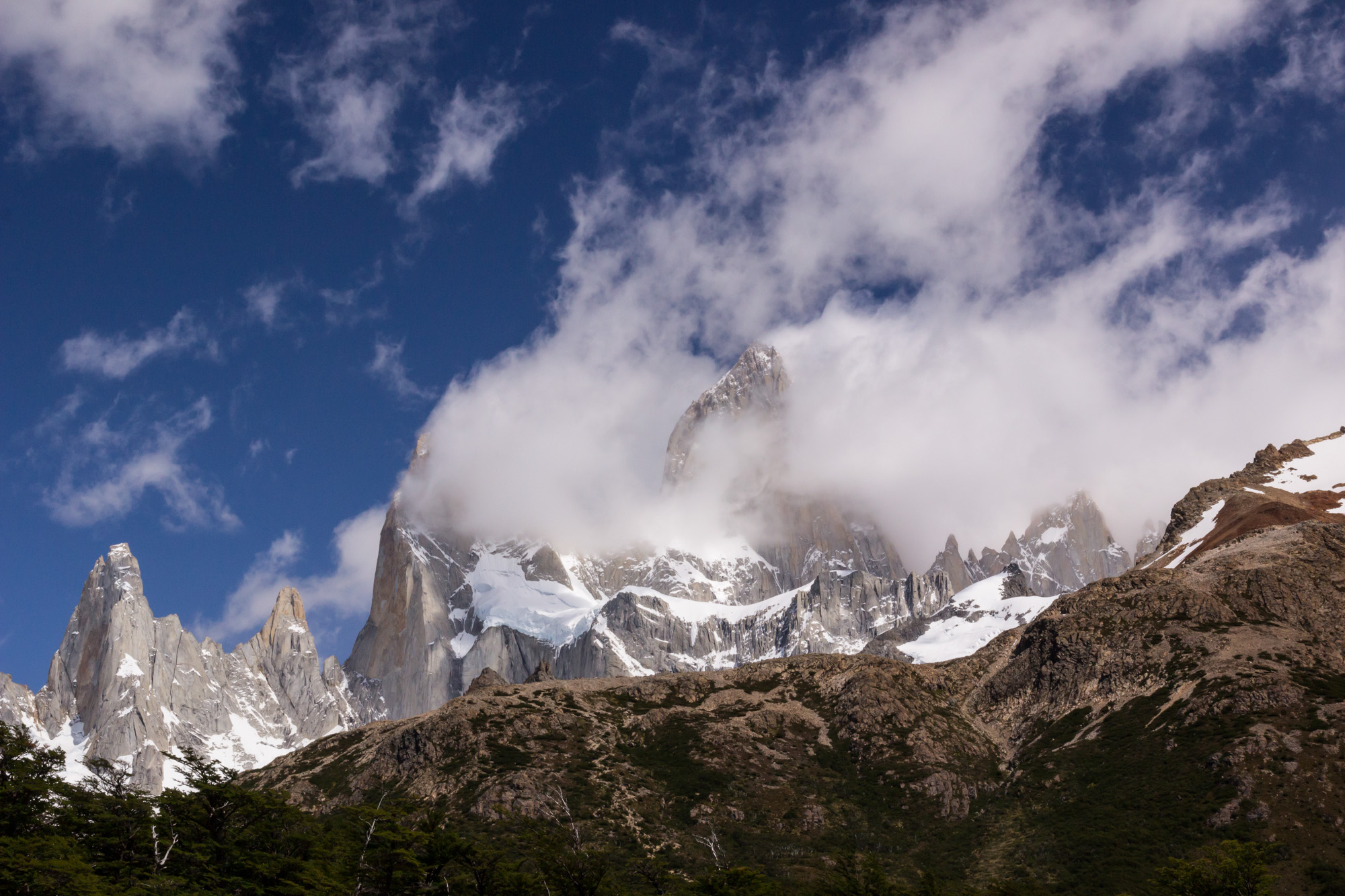 Sheer magnificence - the castellated towers and spires of the Fitzroy chain emerge from the wind-whipped clouds 