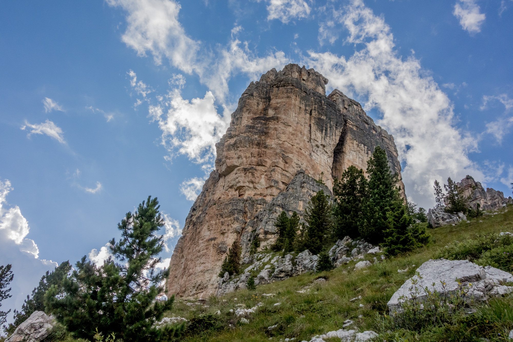 alpine summer rock climbing on cinque torri in the dolomites