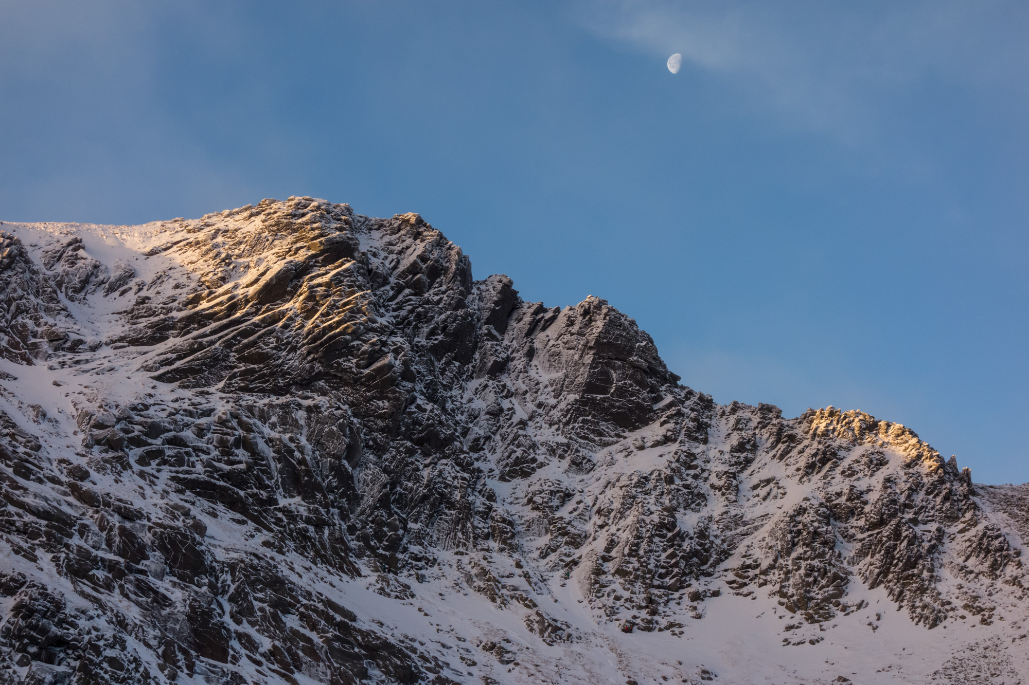 The moon setting over Fiacaill Buttress. It's north easterly aspect resulted in what little westerly wind-transported snow from the plateau there was settling on the cliffs - one of the whiter parts of the coire that day!