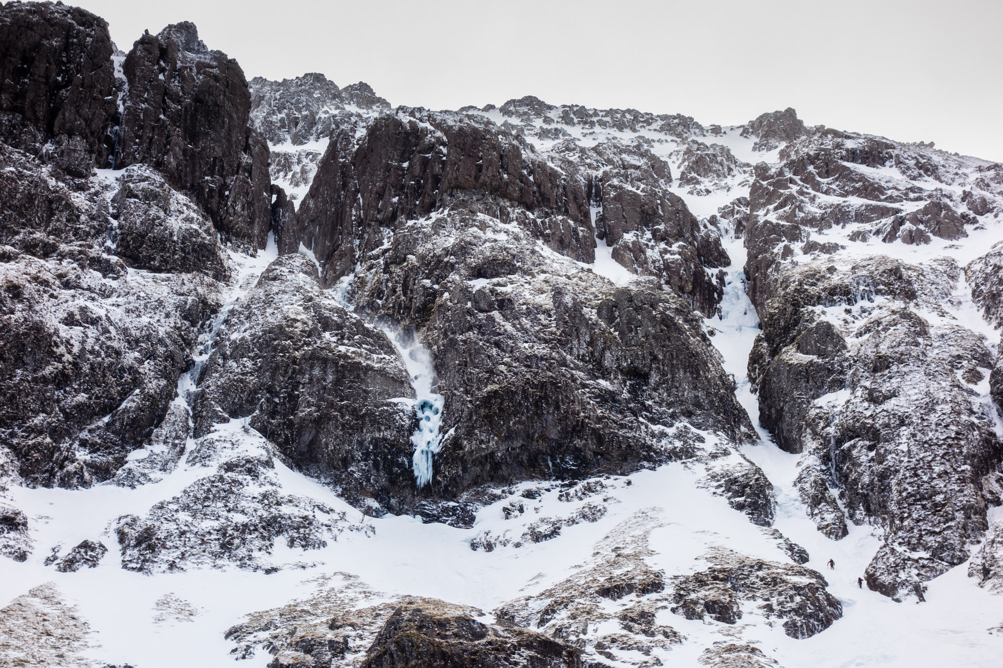scottish winter ice climbing on no6 gully aonach dubh elliots downfall