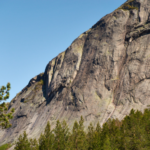 A picture of the South Face of Haegefjell showing the rock climbs of Haegar and Mot Sola