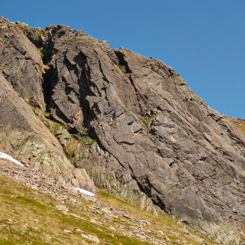 a photo of Grey Man's Crag in Coire Sputan Dearg in the Cairngorms on a hot summers day